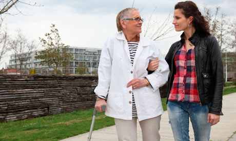 Woman strolling with an elderly lady